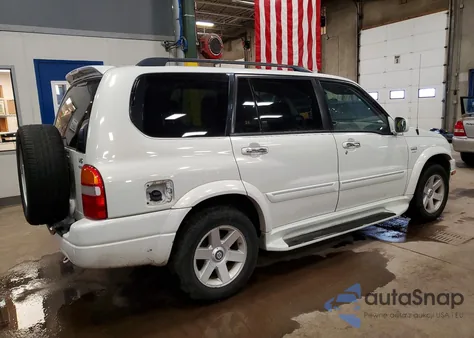 2002 Suzuki Xl7 Plus z USA, uszkodzony, nr VIN JS3TX92V824100804